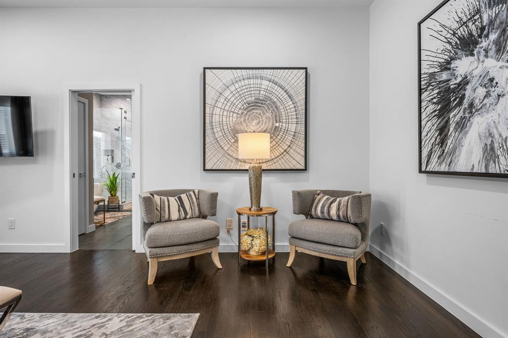 2214 Allen Street, Unit A Dallas, TX 75204 - Photo 28 of 36 a living room with furniture and a wooden floor