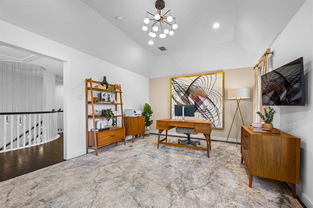 2214 Allen Street, Unit A Dallas, TX 75204 - Photo 32 of 36 a living room with furniture and a flat screen tv