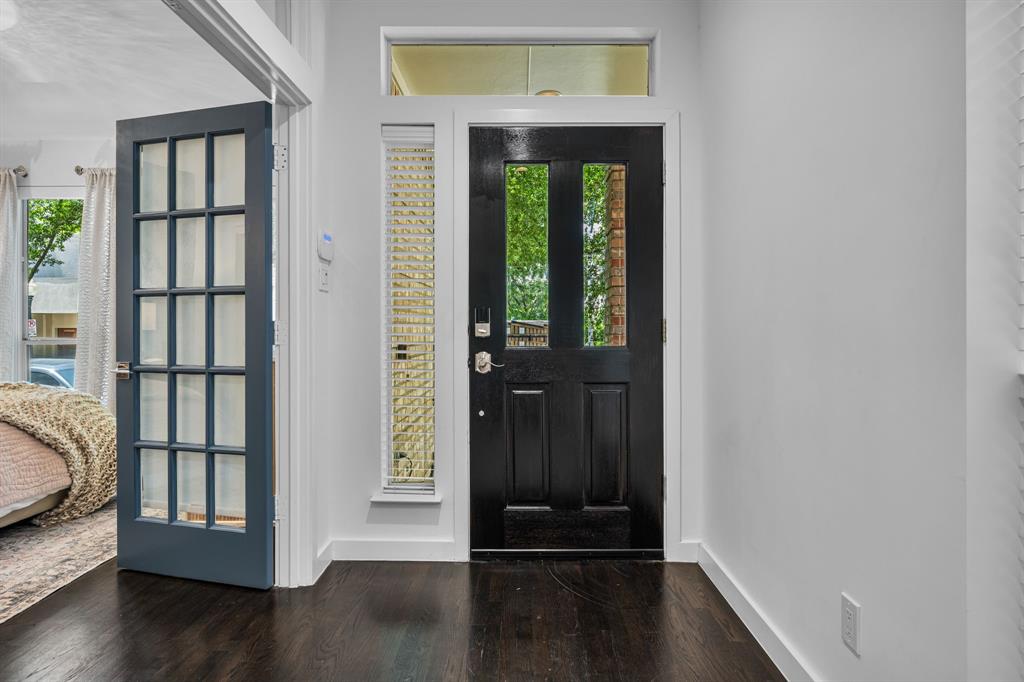 2214 Allen Street, Unit A Dallas, TX 75204 - Photo 6 of 36 wooden floor in a hall with a window