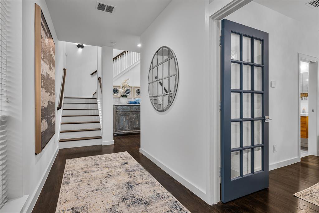 2214 Allen Street, Unit A Dallas, TX 75204 - Photo 7 of 36 a view of a hallway with entryway wooden floor and hall