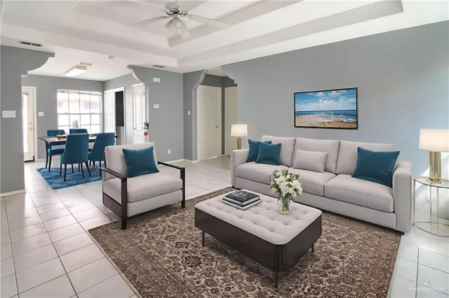 a living room with furniture and a rug