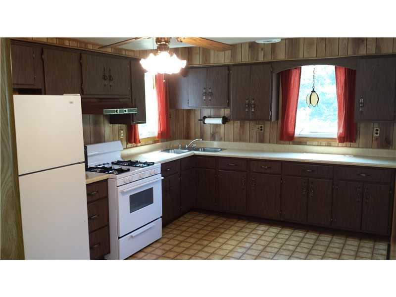 2545 Ridge Rd Extension Economy, PA 15005 - Photo 8 of 22 Kitchen. A second view of the kitchen. The stove is gas.