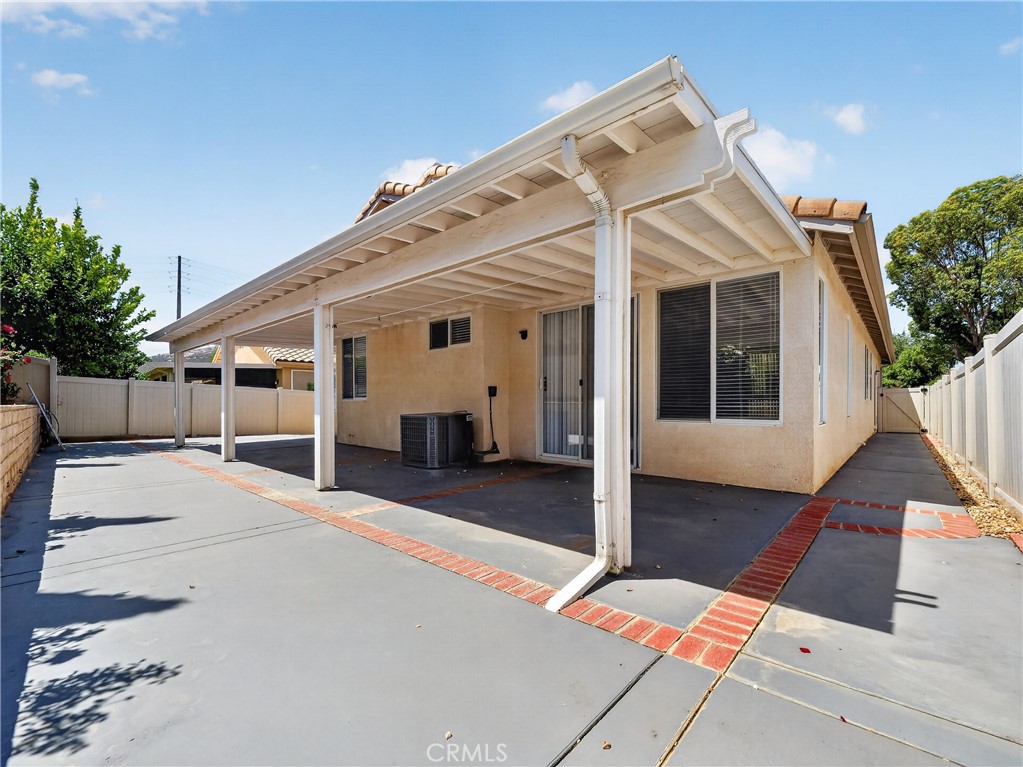 1436 Riviera Avenue Banning, CA 92220 - Photo 42 of 43 a front view of a house with a garage