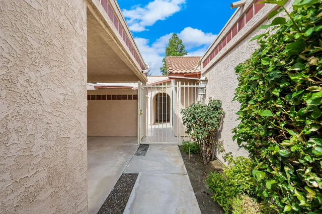 a entryway with a flower plants