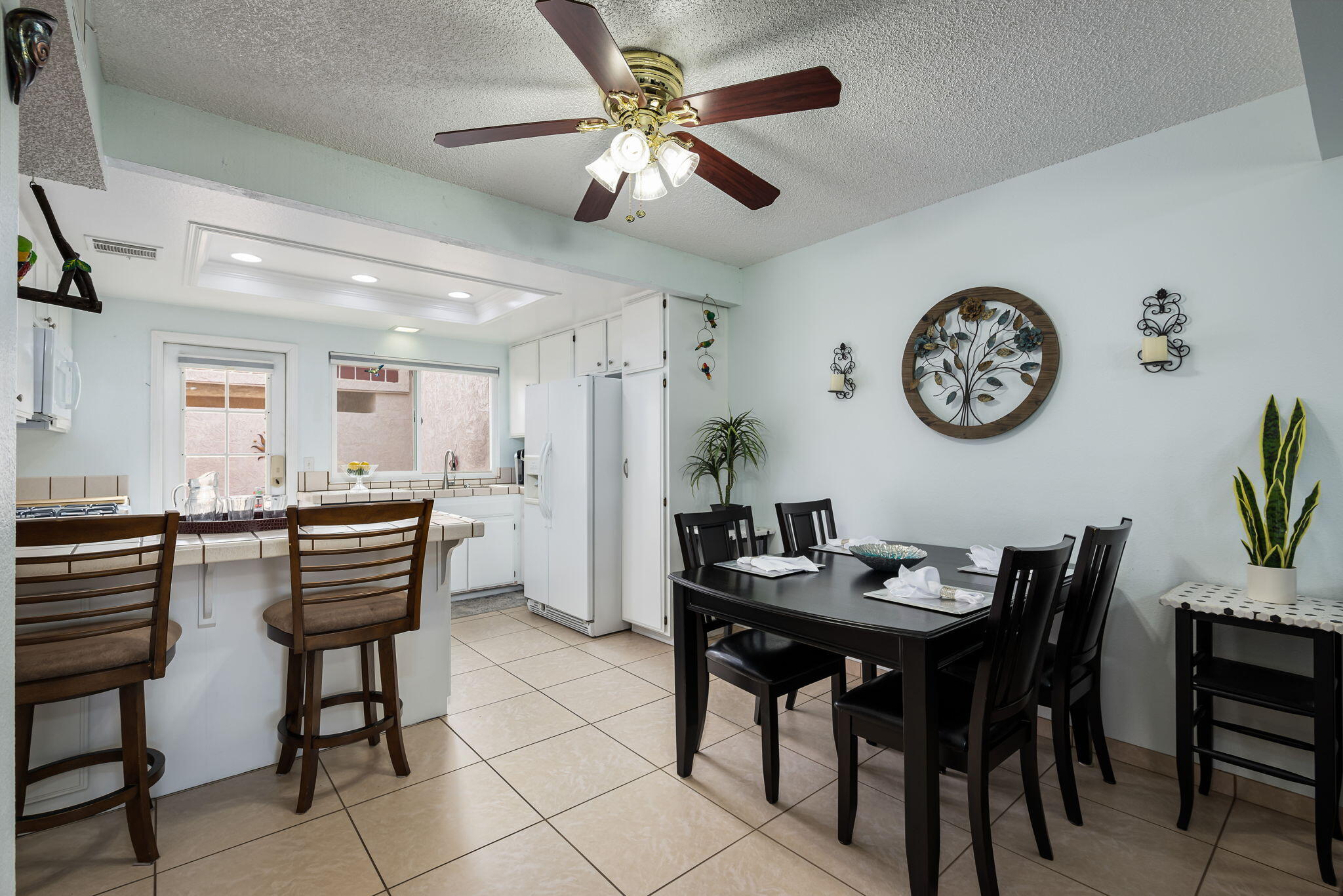 49101 Taylor Street Indio, CA 92201 - Photo 18 of 47 a view of a dining room with furniture and a table