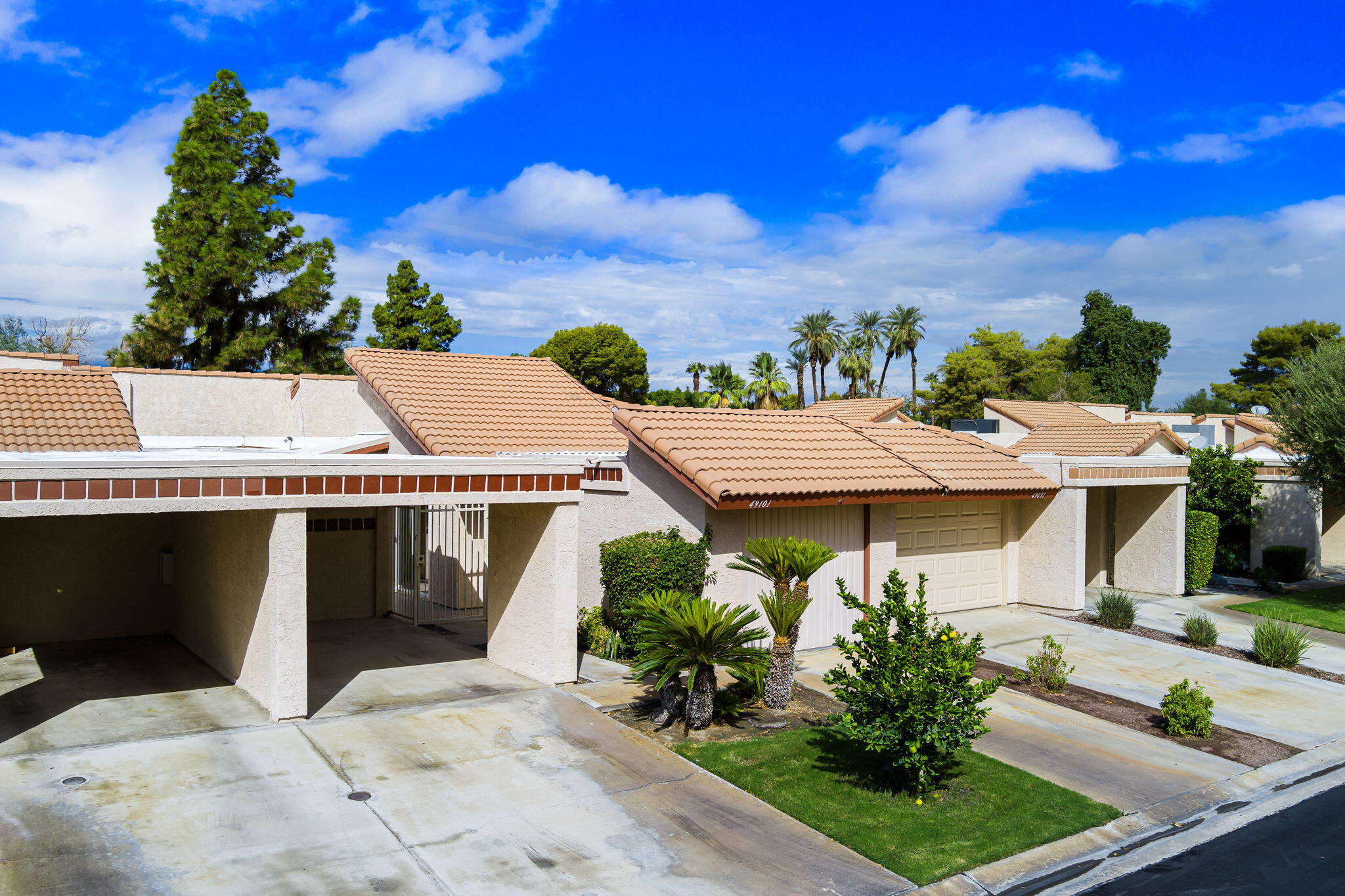 49101 Taylor Street Indio, CA 92201 - Photo 2 of 47 a view of house with outdoor space and sitting area