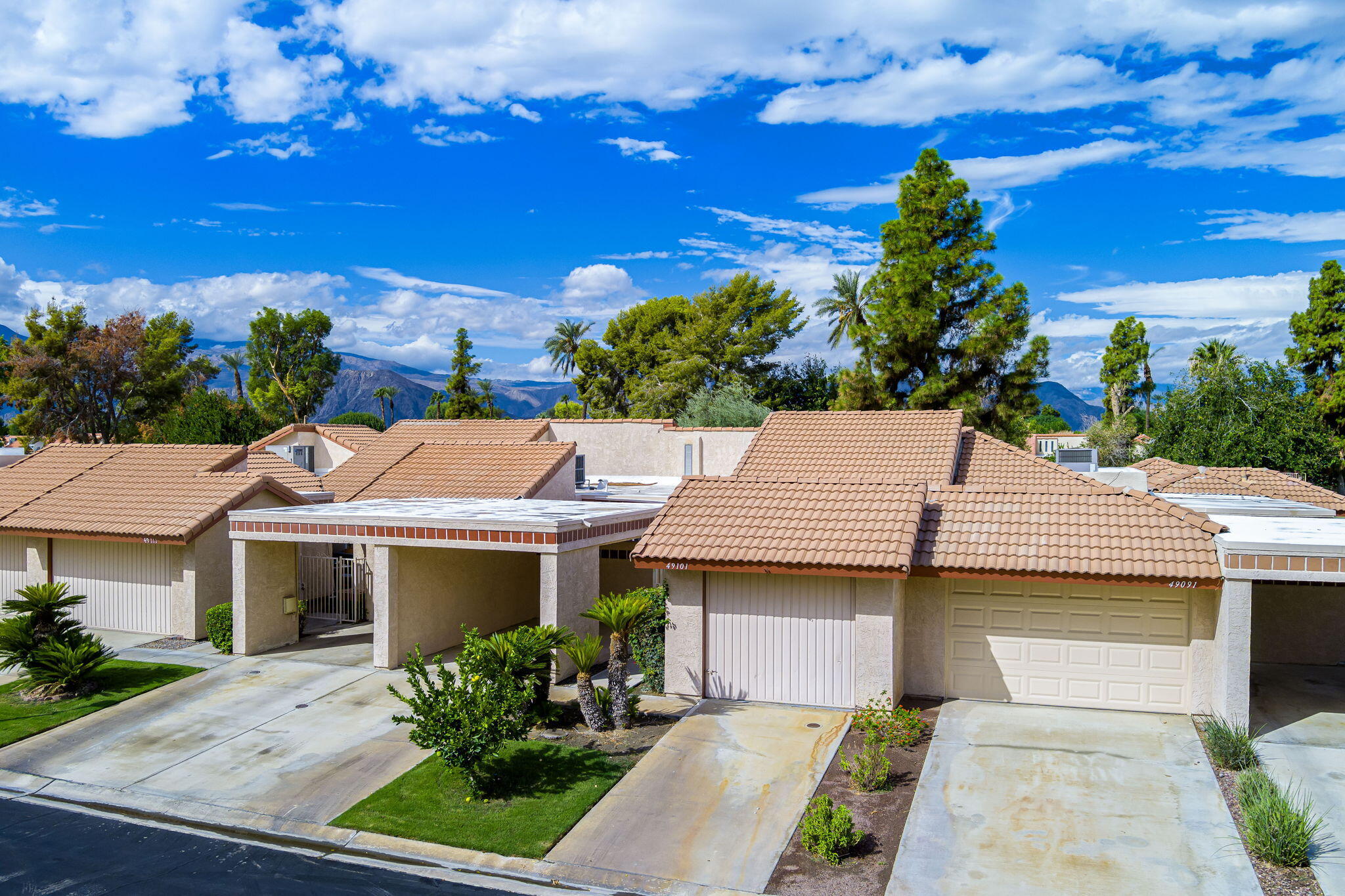 49101 Taylor Street Indio, CA 92201 - Photo 3 of 47 a view of a house with a patio