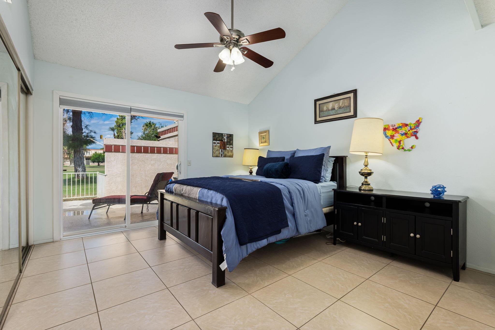 49101 Taylor Street Indio, CA 92201 - Photo 40 of 47 a bedroom with a bed and painting on the wall