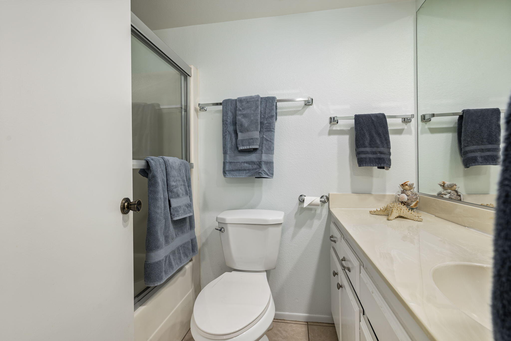 49101 Taylor Street Indio, CA 92201 - Photo 43 of 47 a bathroom with a toilet sink and mirror