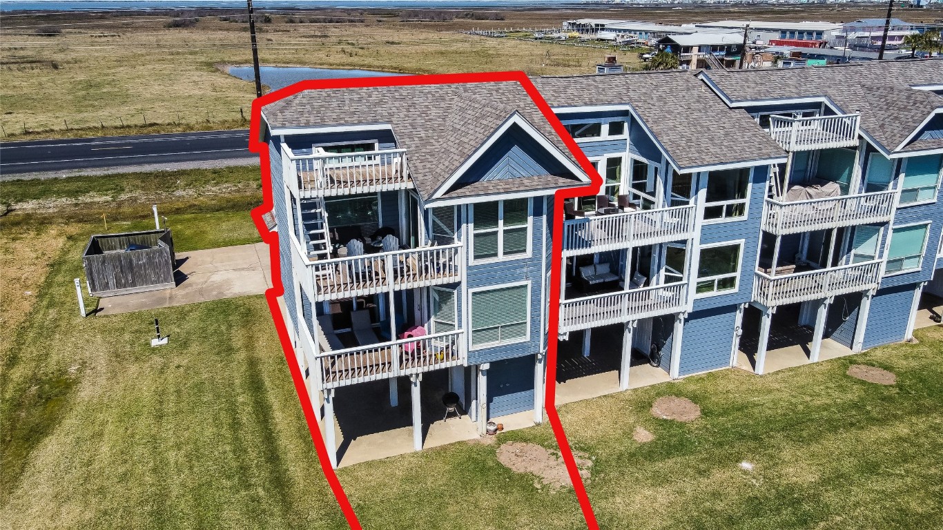 17729 Termini-San Luis Pass Road Galveston, TX 77554 - Photo 2 of 36 a backyard of a house