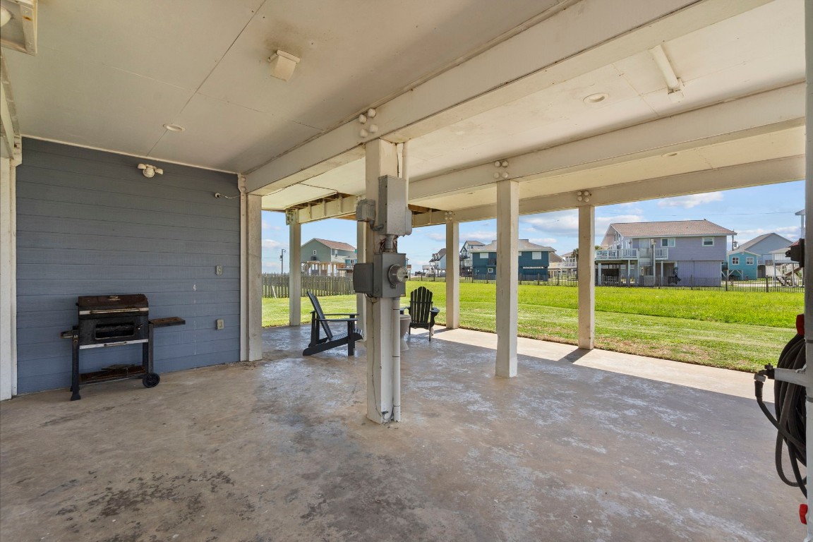 17729 Termini-San Luis Pass Road Galveston, TX 77554 - Photo 33 of 36 a view of a room with porch and a yard
