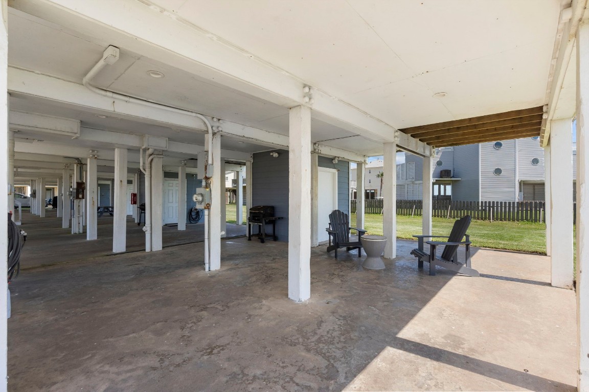 17729 Termini-San Luis Pass Road Galveston, TX 77554 - Photo 35 of 36 a view of a porch with chairs and backyard