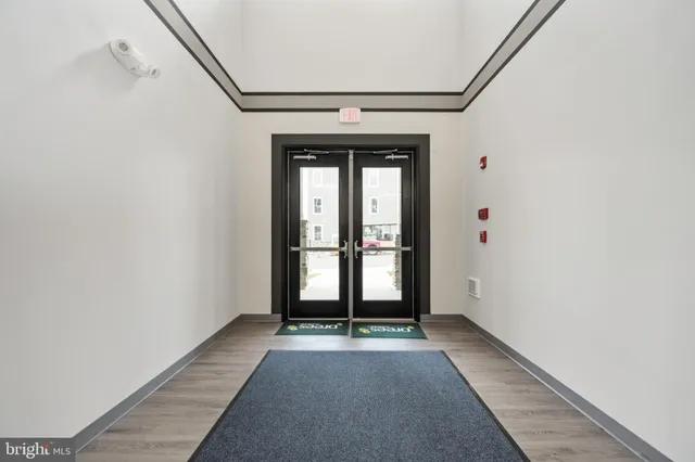 a view of entryway with wooden floor