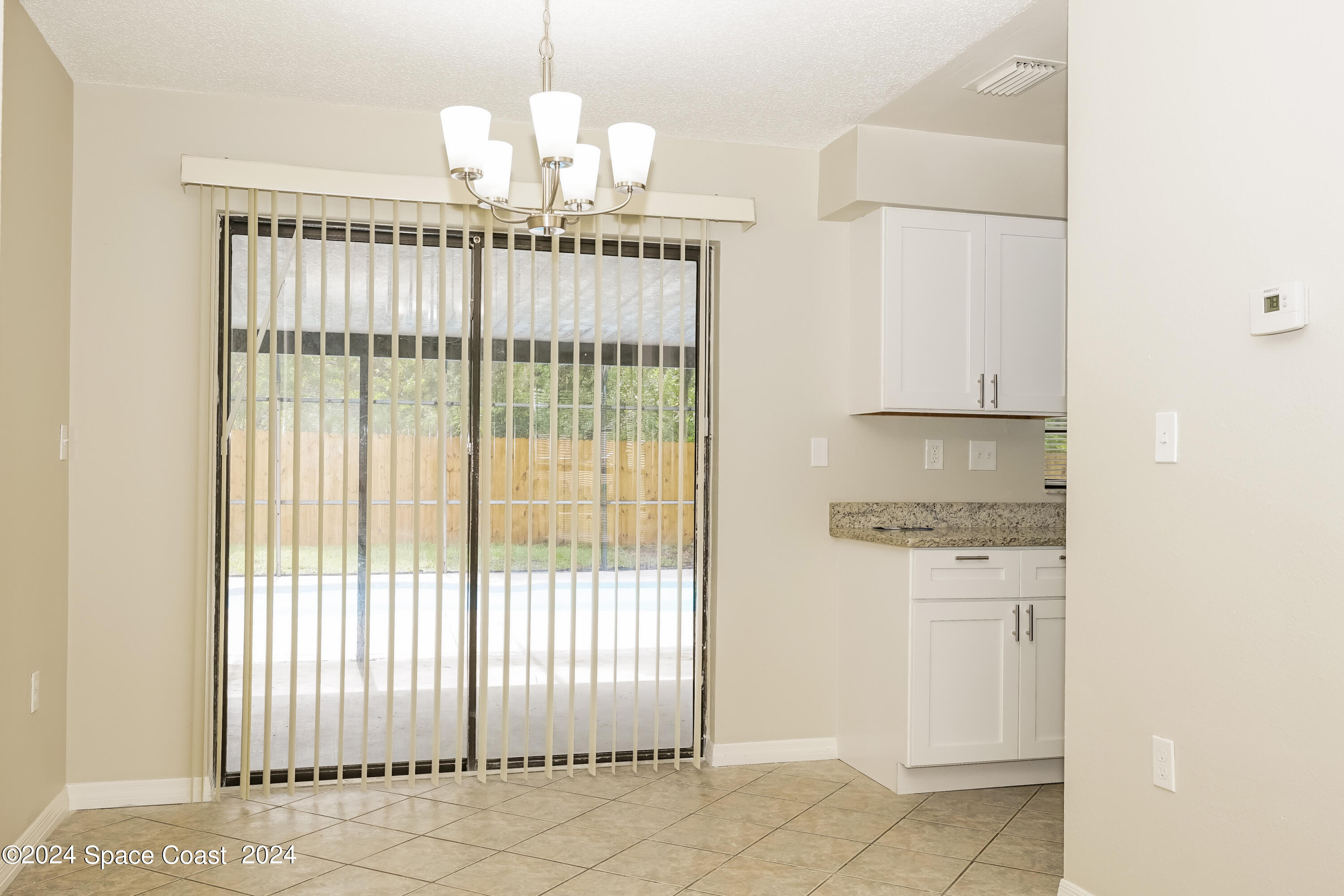 6830 Caliph Avenue Cocoa, FL 32927 - Photo 4 of 16 004-photo-dining-room-11383782