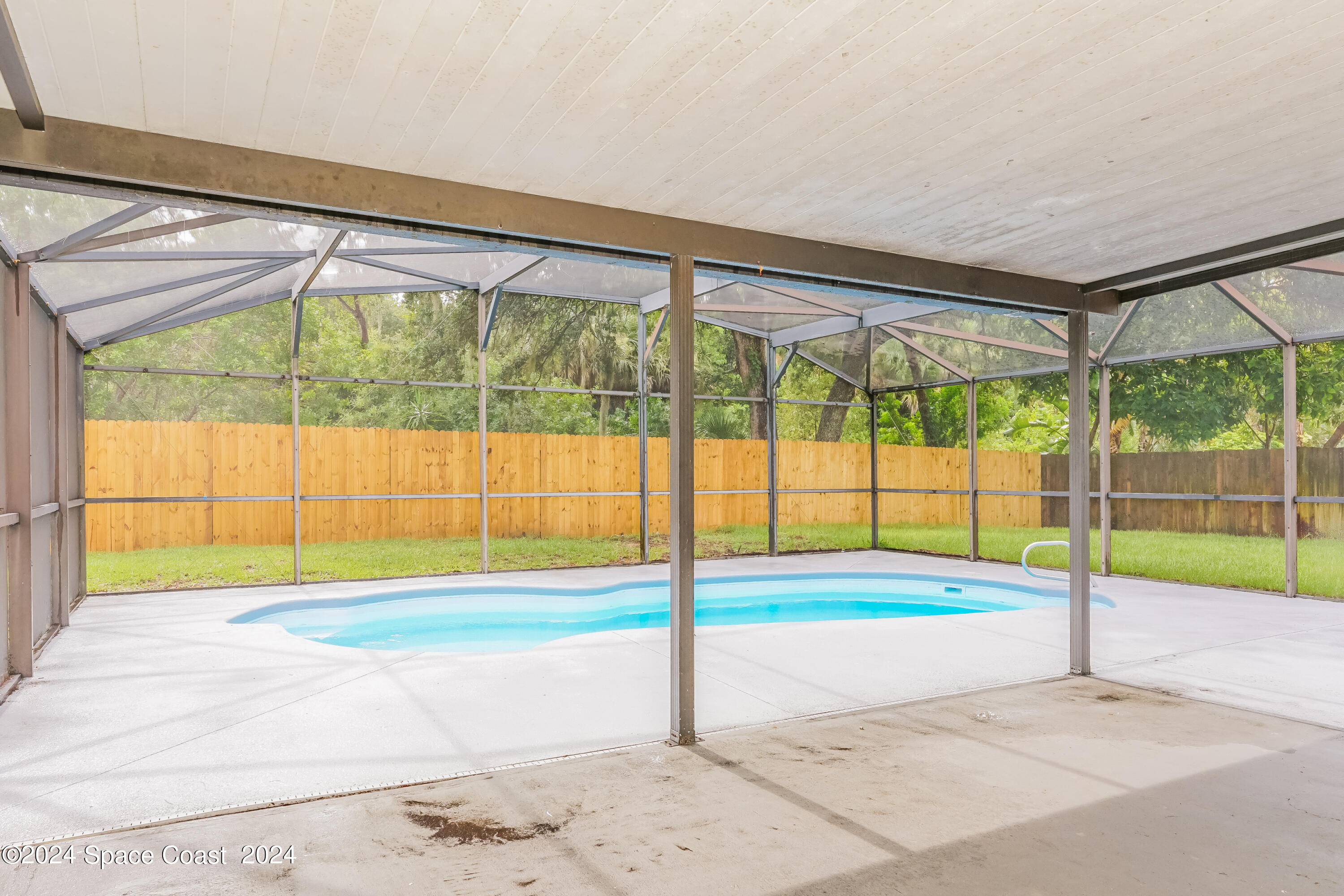 6830 Caliph Avenue Cocoa, FL 32927 - Photo 7 of 16 007-photo-sun-room-11383777