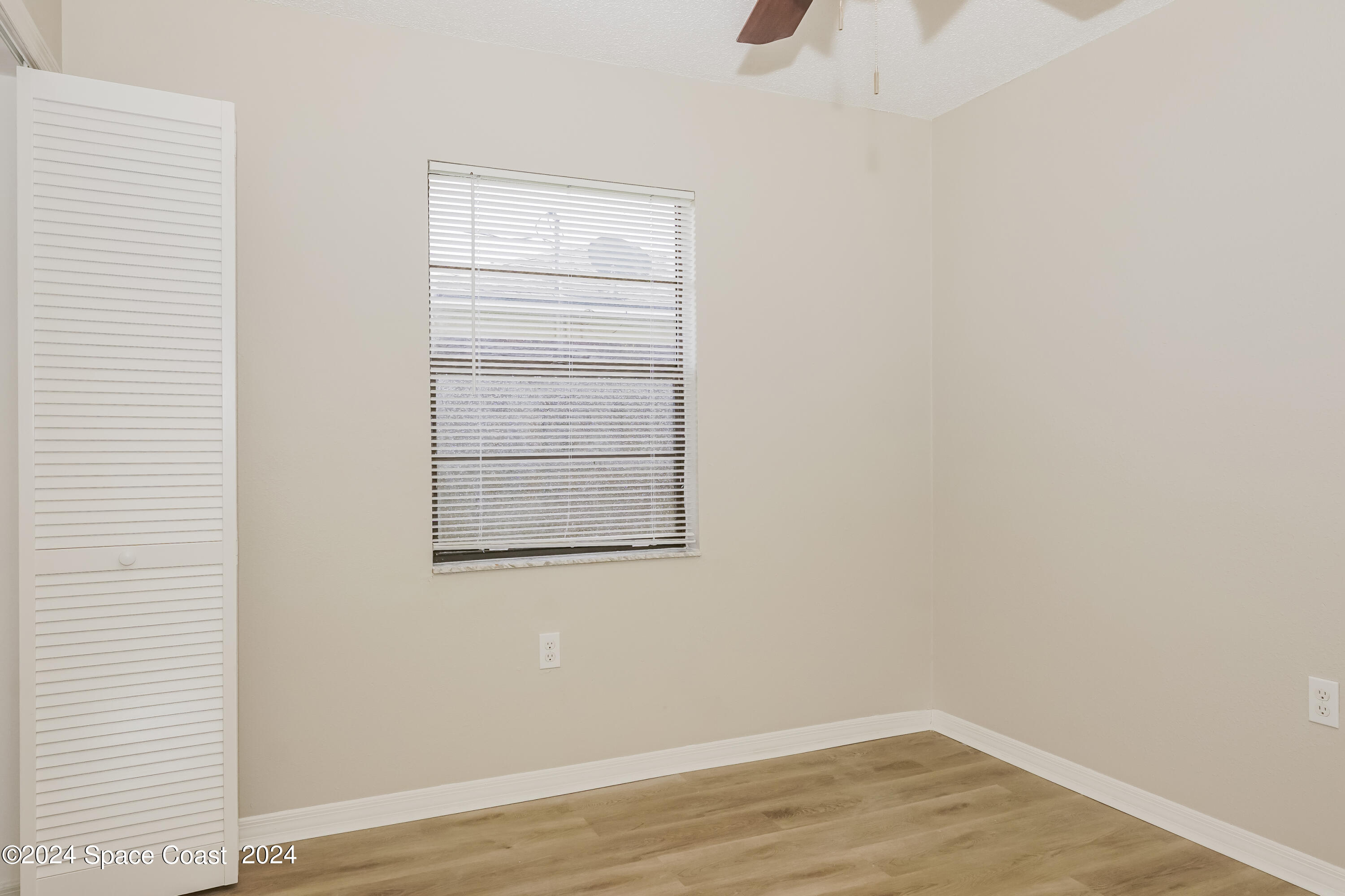 6830 Caliph Avenue Cocoa, FL 32927 - Photo 9 of 16 009-photo-primary-bedroom-11383786