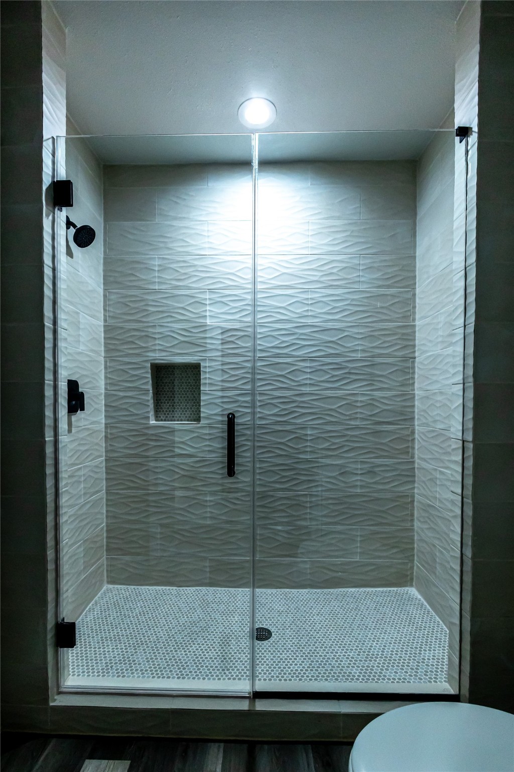 102 Marsden Street, Unit 4 Houston, TX 77011 - Photo 12 of 26 a bathroom with a shower