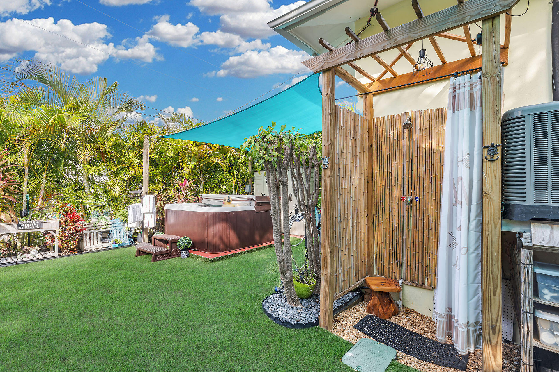 211 120 St Gulf, Unit B Marathon, FL 33050 - Photo 11 of 33 a view of a backyard with plants and garden