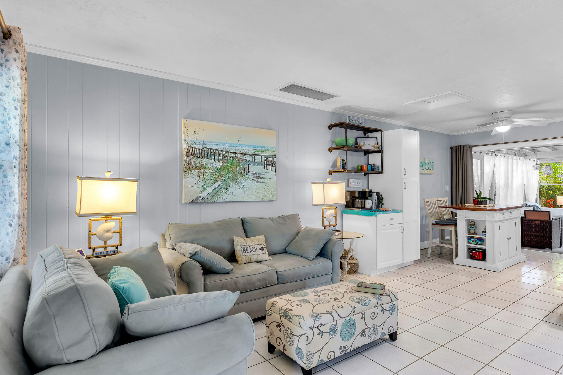 211 120 St Gulf, Unit B Marathon, FL 33050 - Photo 13 of 33 a living room with furniture and a flat screen tv