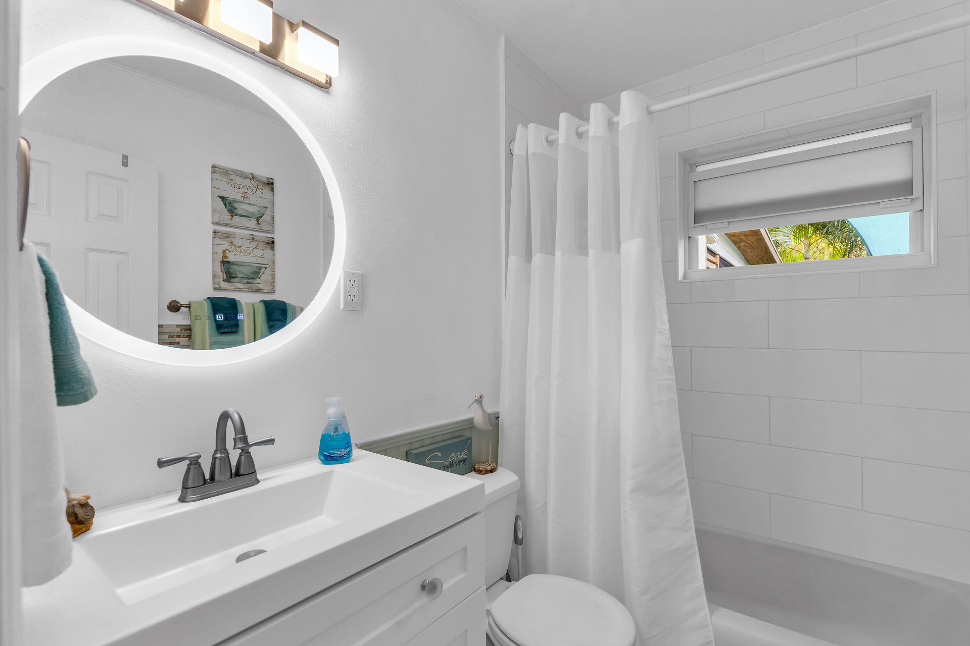 211 120 St Gulf, Unit B Marathon, FL 33050 - Photo 21 of 33 a bathroom with a sink a toilet and shower