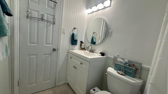 211 120 St Gulf, Unit B Marathon, FL 33050 - Photo 22 of 33 a bathroom with a toilet sink and mirror