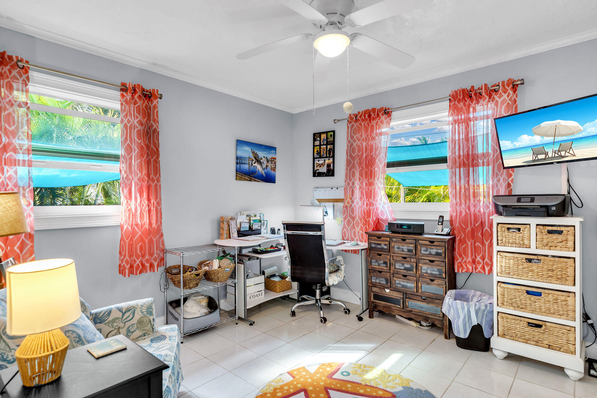 211 120 St Gulf, Unit B Marathon, FL 33050 - Photo 23 of 33 a reading room with furniture a flat screen tv and a window