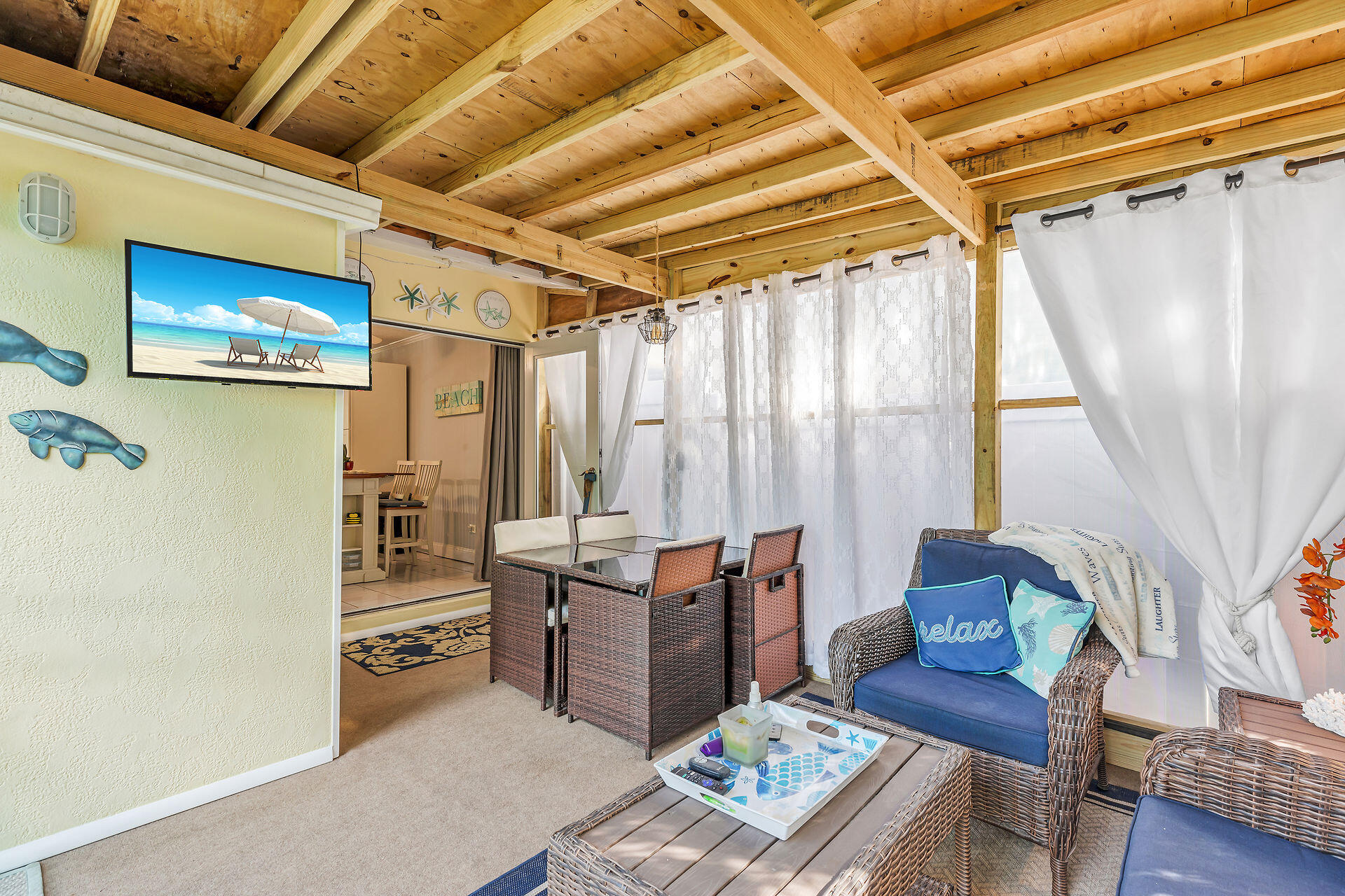 211 120 St Gulf, Unit B Marathon, FL 33050 - Photo 28 of 33 a outdoor living space with furniture and a rug