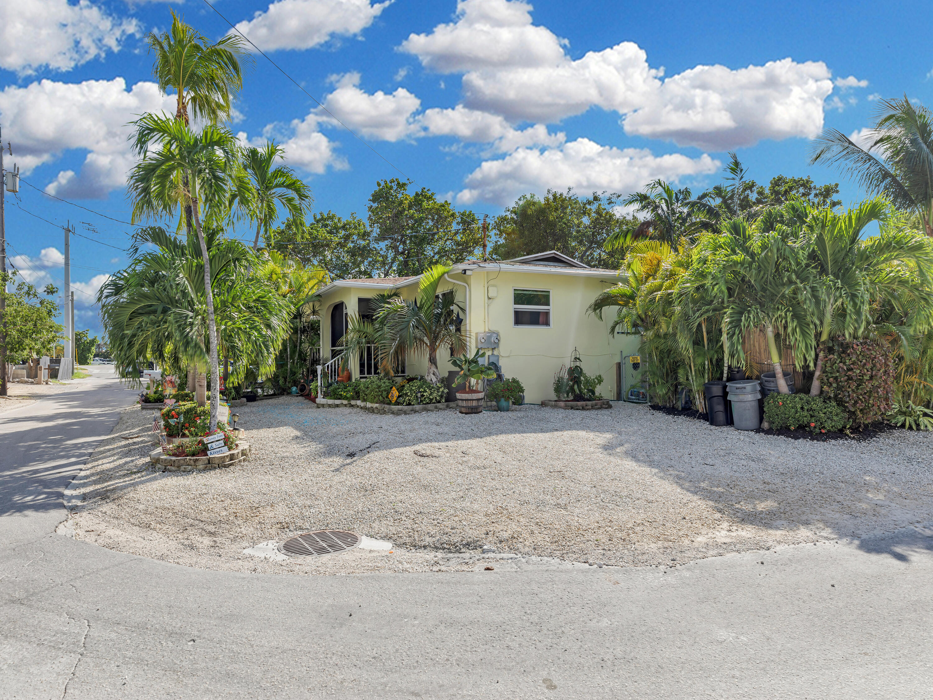 211 120 St Gulf, Unit B Marathon, FL 33050 - Photo 3 of 33 a view of a house with a yard and plant