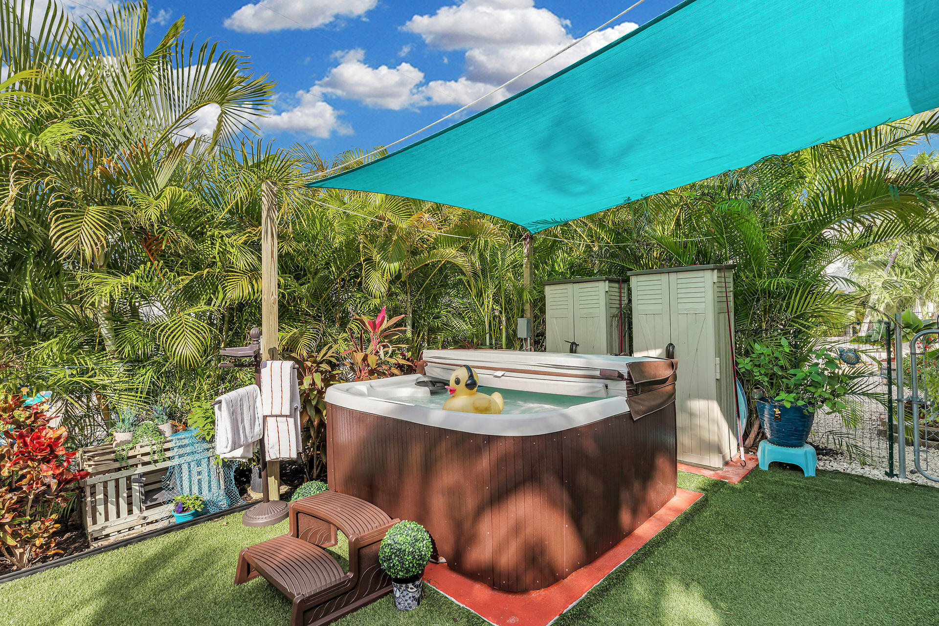 211 120 St Gulf, Unit B Marathon, FL 33050 - Photo 9 of 33 a view of a backyard with plants and patio