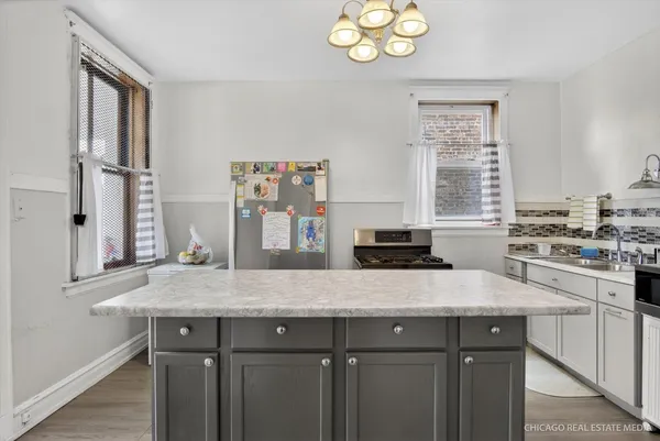 $399,000 | 1011 North Menard Avenue, Chicago, IL 60651