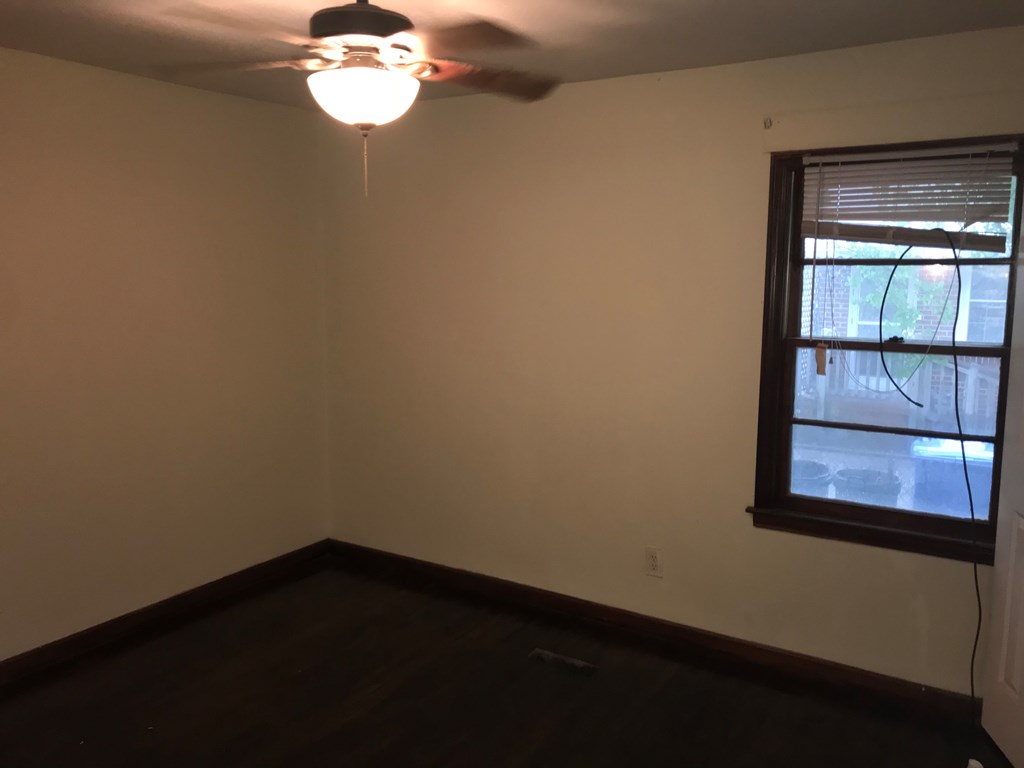 2026 Reese Road Columbus, GA 31907 - Photo 4 of 8 a view of a small space with wooden floor and a window