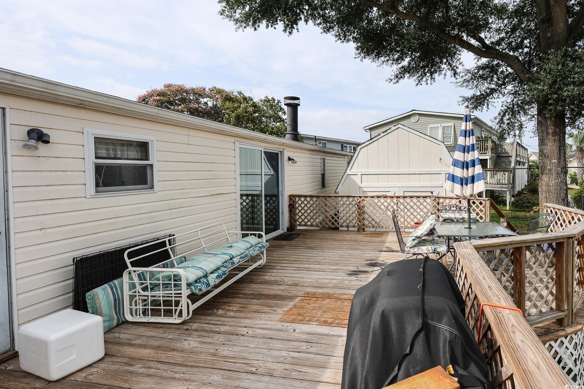 1522 Cove Lane Murrells Inlet, SC 29576 - Photo 27 of 33 Deck with outdoor dining area