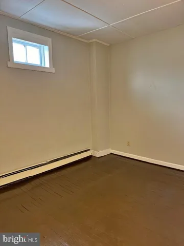 an empty room with a workbench