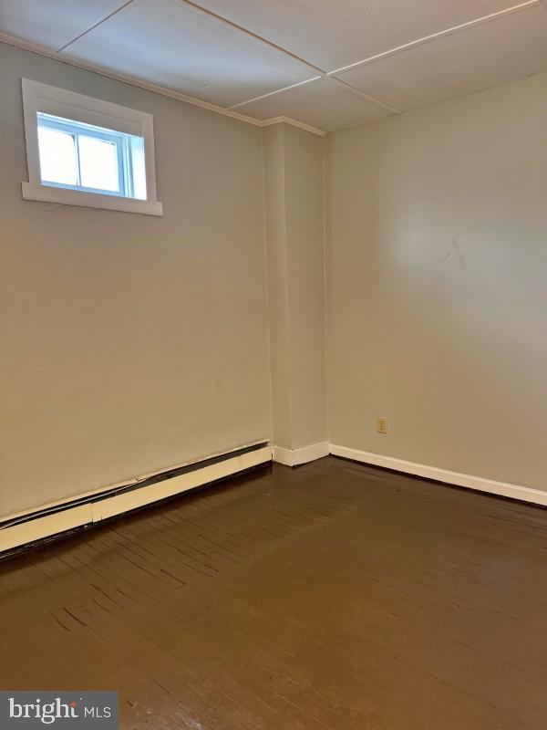 1134 West King Street, Unit 1 York, PA 17404 - Photo 5 of 6 an empty room with a workbench