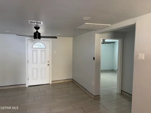 a kitchen with a stove and a sink