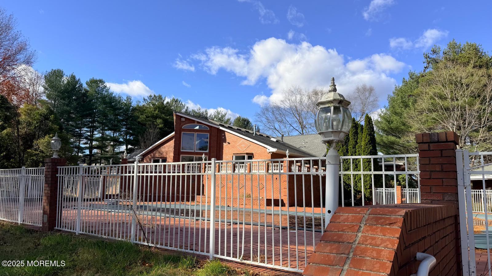 19-23 Roberts Road Millstone Township, NJ 08535 - Photo 111 of 118 a view of a house with a deck