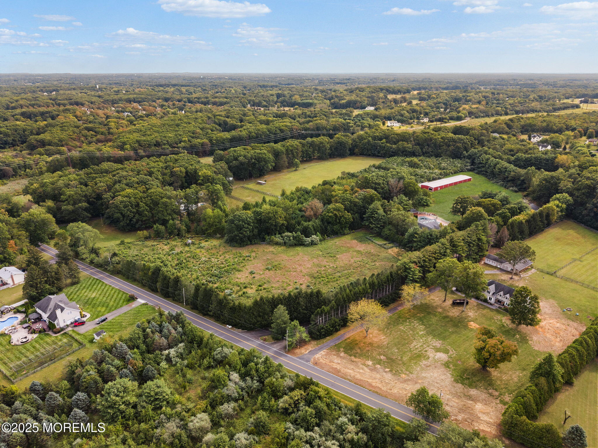 19-23 Roberts Road Millstone Township, NJ 08535 - Photo 16 of 118 an aerial view of residential houses with outdoor space