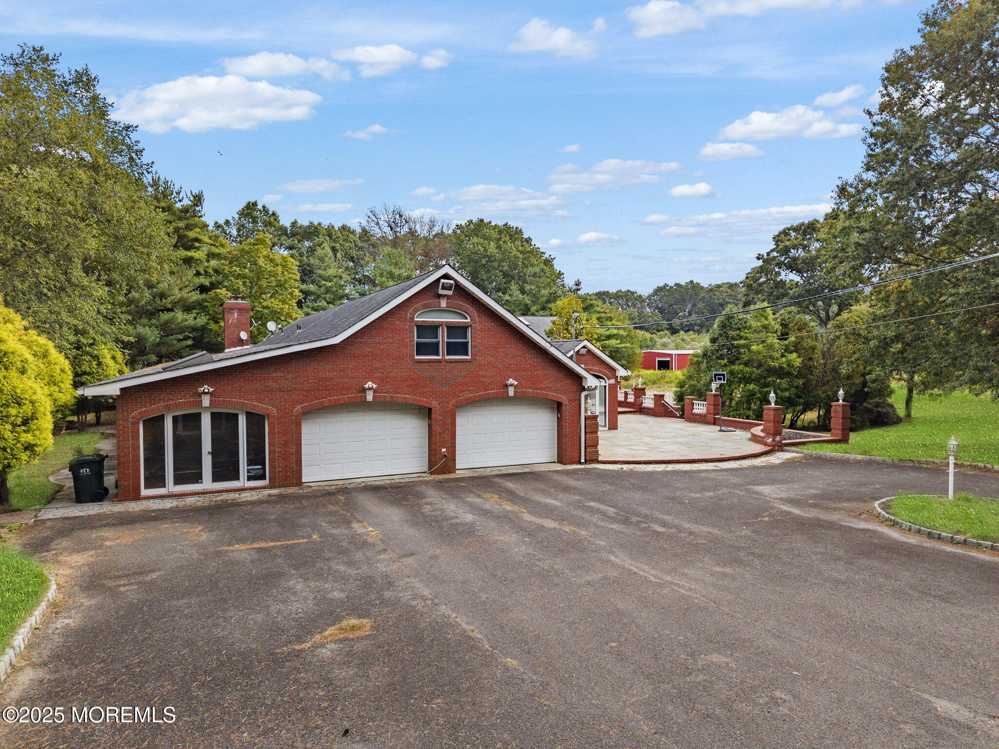 19-23 Roberts Road Millstone Township, NJ 08535 - Photo 18 of 118 a front view of a house with a yard and trees