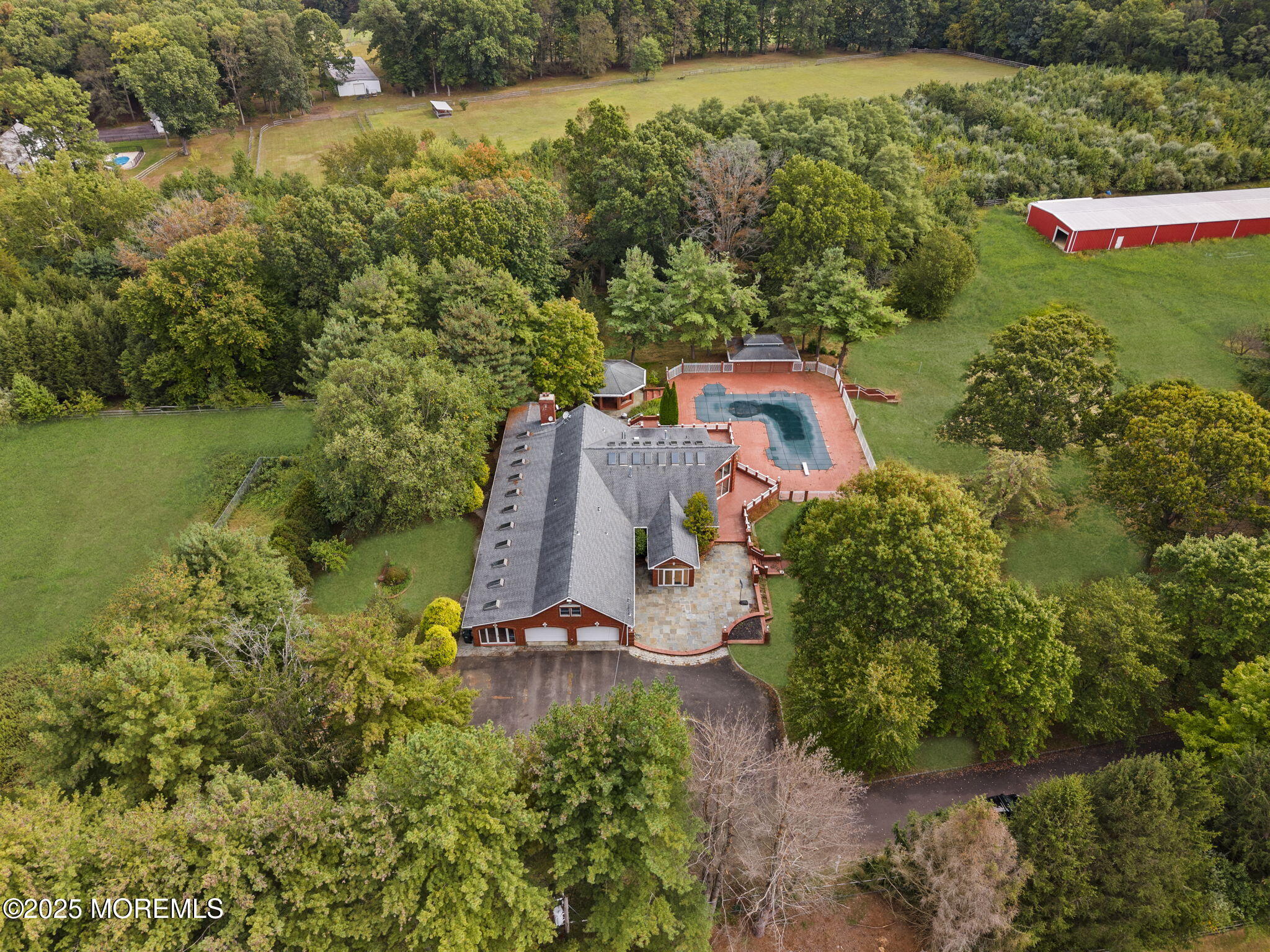 19-23 Roberts Road Millstone Township, NJ 08535 - Photo 23 of 118 an aerial view of a house with a yard and lake view