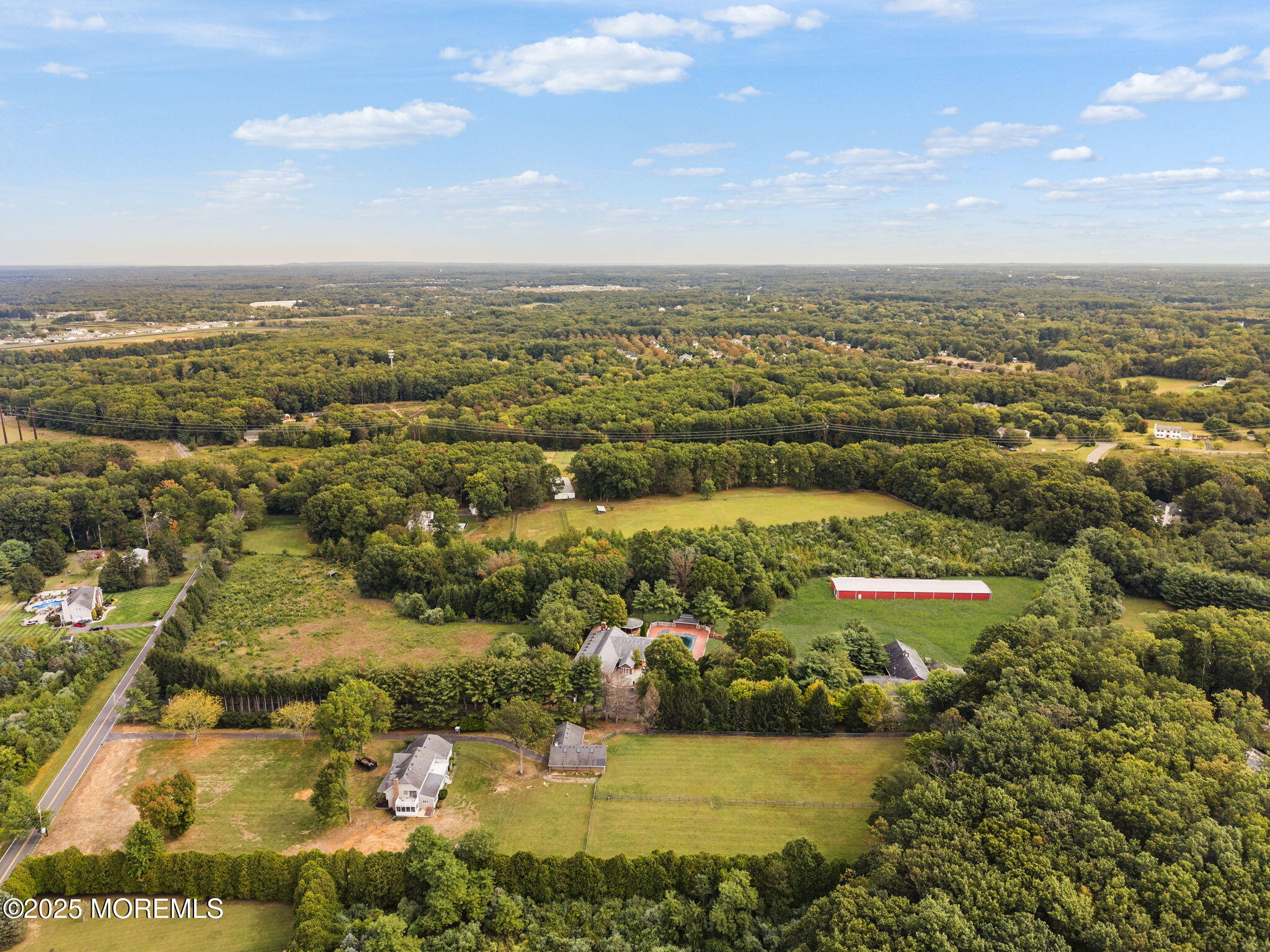 19-23 Roberts Road Millstone Township, NJ 08535 - Photo 24 of 118 an aerial view of residential building and lake