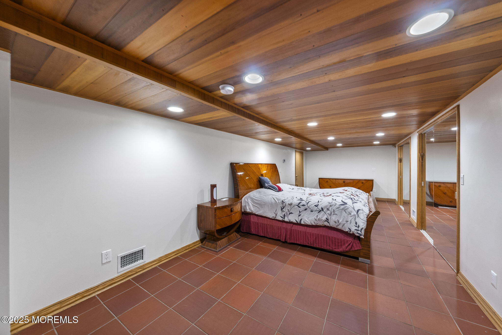 19-23 Roberts Road Millstone Township, NJ 08535 - Photo 45 of 118 a spacious bedroom with a bed and a walk in closet