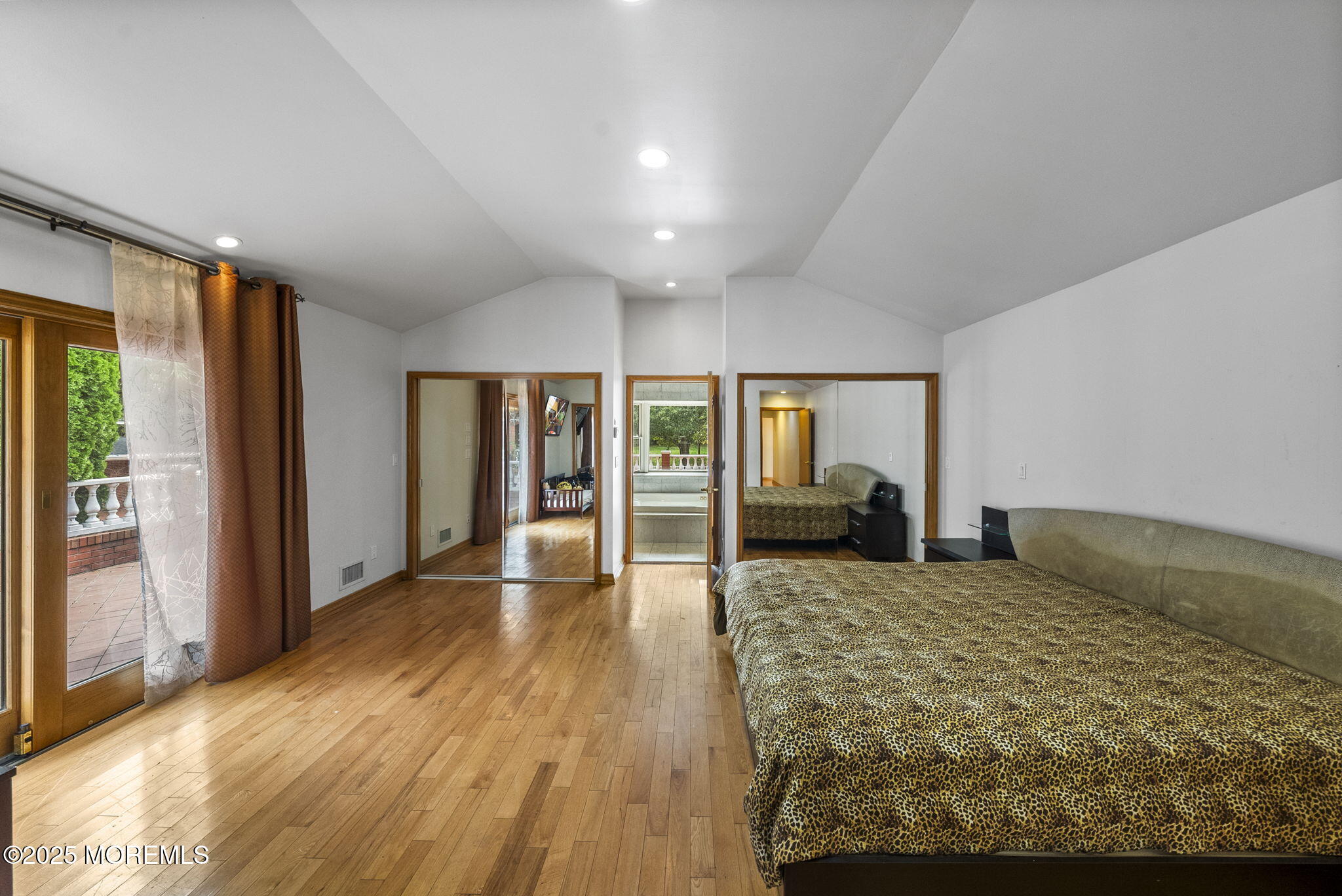 19-23 Roberts Road Millstone Township, NJ 08535 - Photo 59 of 118 a large bedroom with wooden floor closet and windows