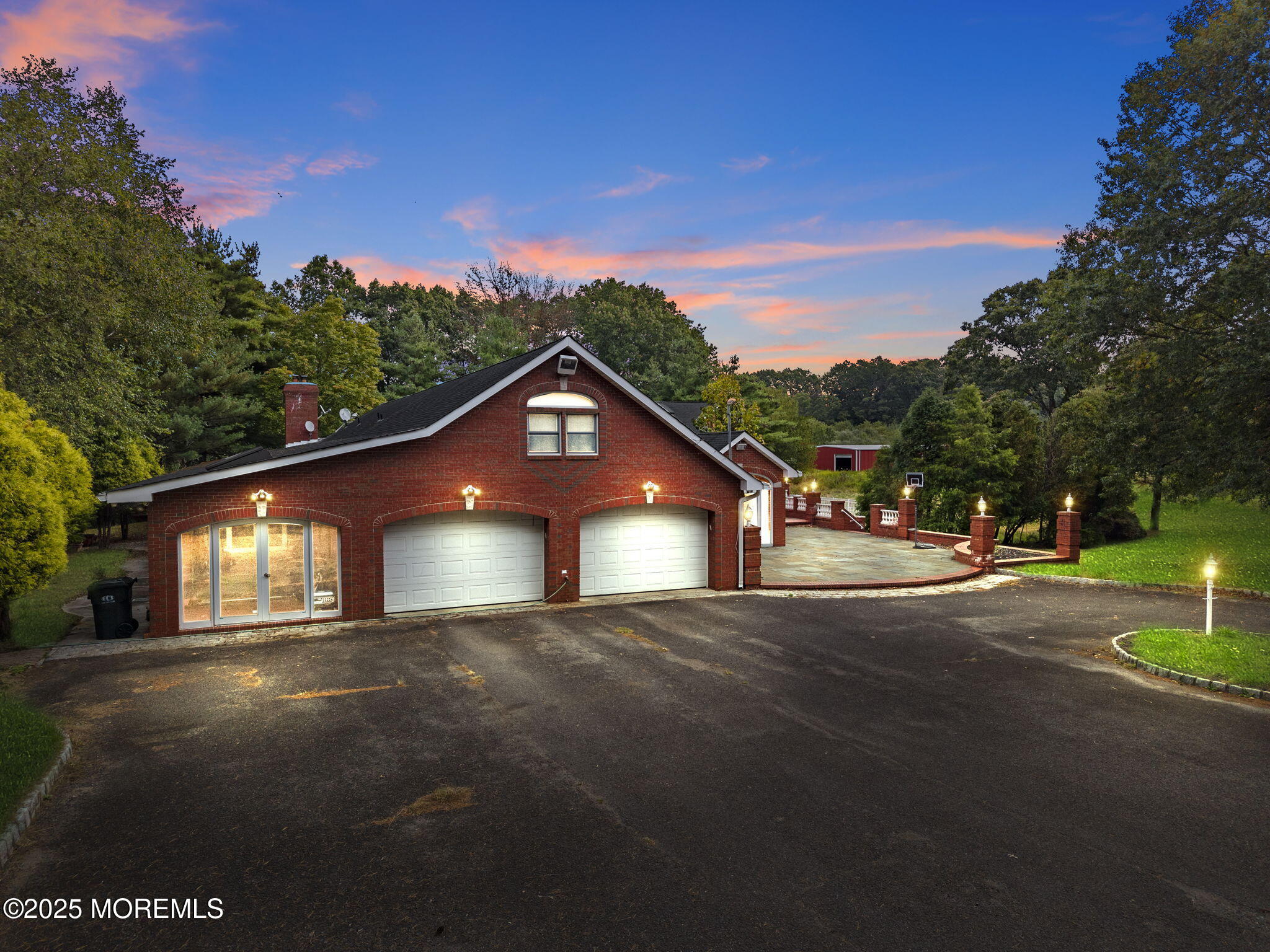 19-23 Roberts Road Millstone Township, NJ 08535 - Photo 6 of 118 a front view of a house with a yard and garage