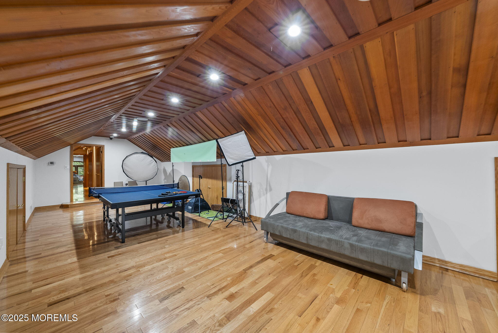 19-23 Roberts Road Millstone Township, NJ 08535 - Photo 73 of 118 a living room with furniture and a wooden floor