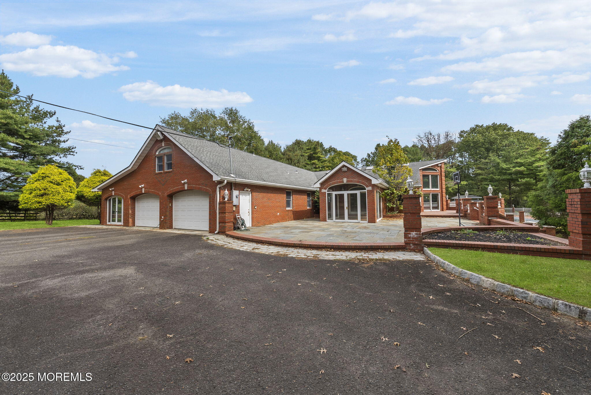 19-23 Roberts Road Millstone Township, NJ 08535 - Photo 80 of 118 a front view of a house with a yard and garage