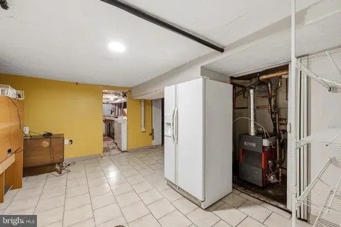 a bathroom with a shower and a sink