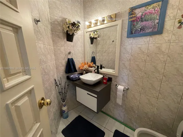 a living room with furniture window and wooden floor