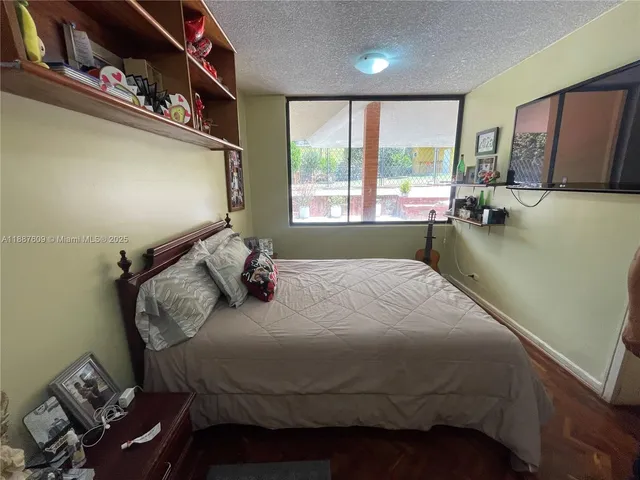 a view of staircase with white walls