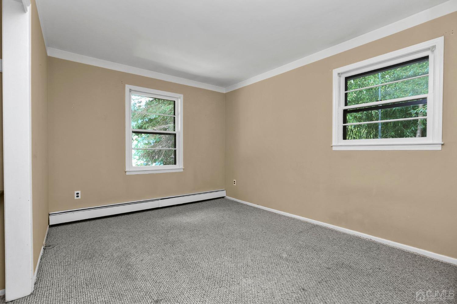 111 Old Forge Road Monroe Township, NJ 08831 - Photo 17 of 39 an empty room with windows