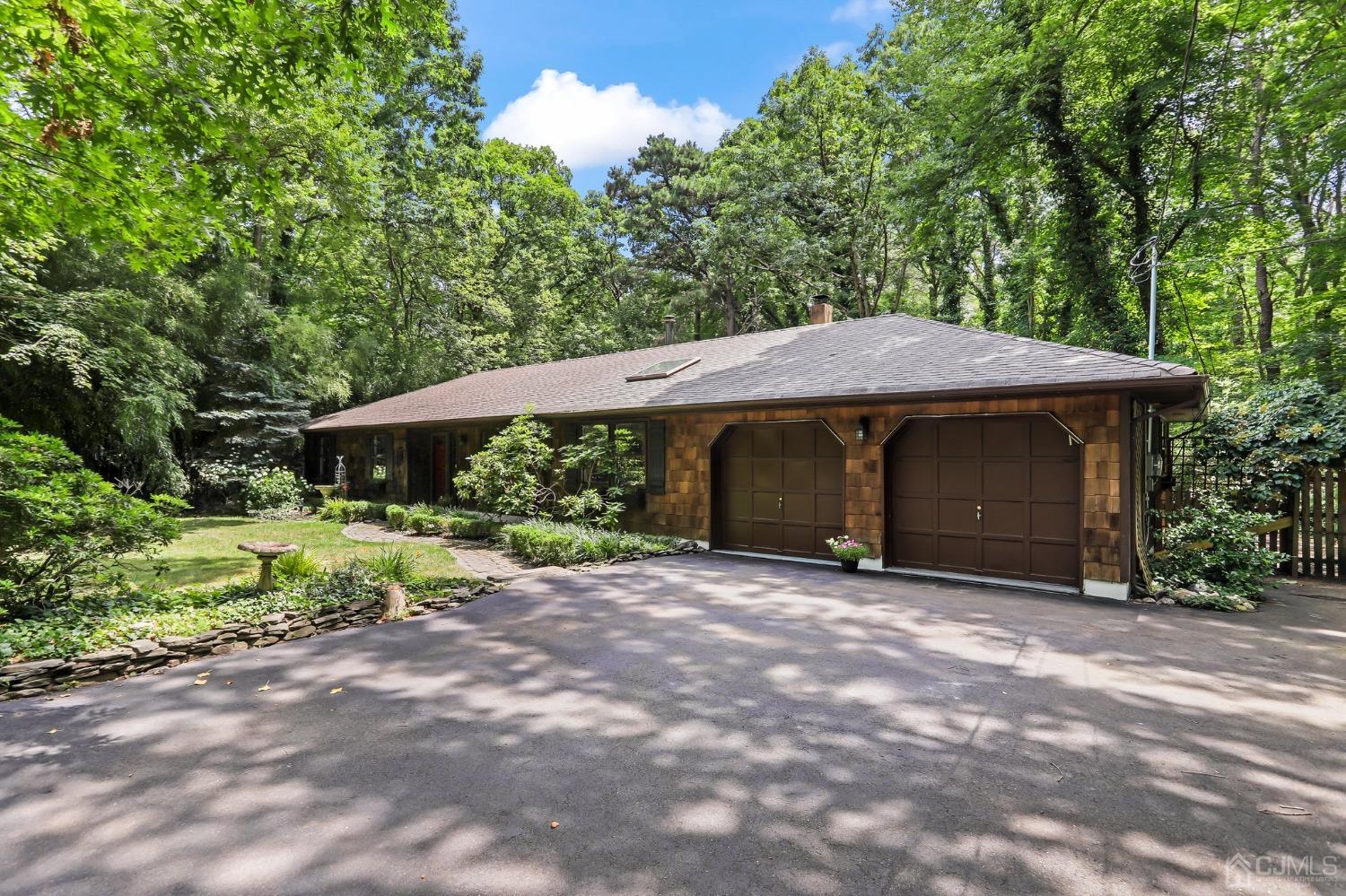 111 Old Forge Road Monroe Township, NJ 08831 - Photo 22 of 39 a view of a house with a yard and hanging chair